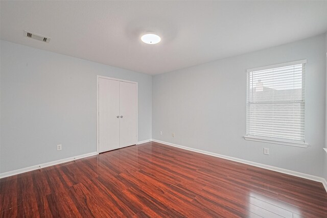 2123 Gable Hollow Ln, Katy, TX 77450 - unfurnished bedroom featuring wood finished floors and a closet