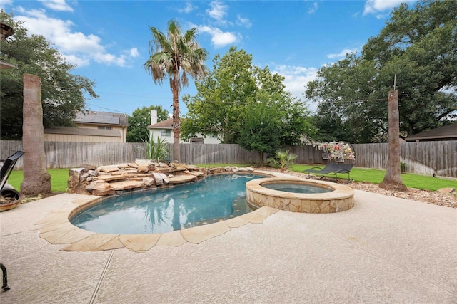 6319 Founding Dr, Katy, TX 77449 - view of swimming pool with a patio area, a fenced backyard, and a pool with connected hot tub