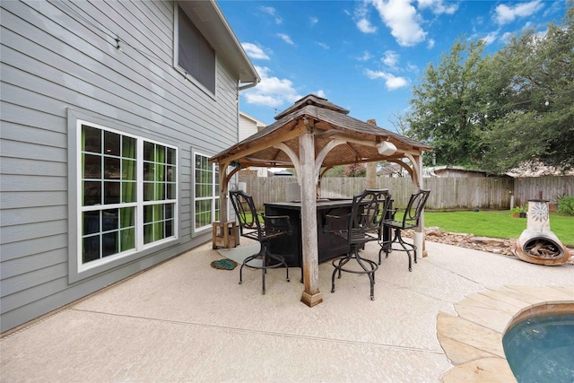 6319 Founding Dr, Katy, TX 77449 - fenced backyard featuring a gazebo, a patio area, and outdoor dining area