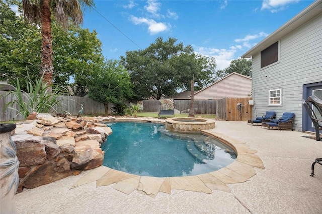 6319 Founding Dr, Katy, TX 77449 - view of swimming pool featuring a fenced backyard, a patio, and a pool with connected hot tub