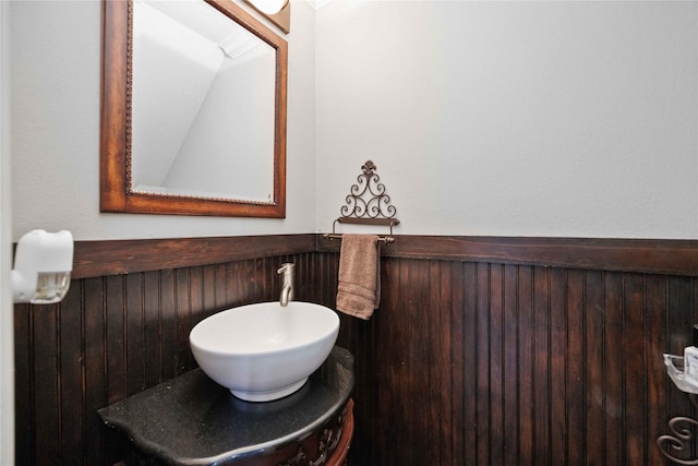 6319 Founding Dr, Katy, TX 77449 - bathroom with a sink and a wainscoted wall