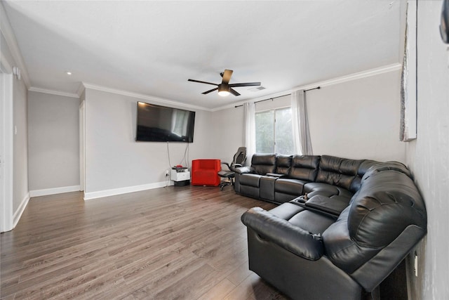 6319 Founding Dr, Katy, TX 77449 - living room featuring ornamental molding, a ceiling fan, and wood finished floors