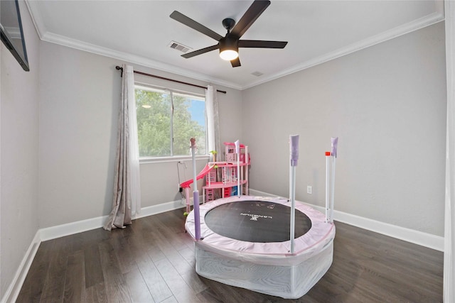 6319 Founding Dr, Katy, TX 77449 - playroom featuring dark wood finished floors, ceiling fan, and crown molding