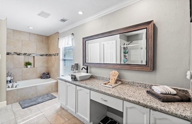 6319 Founding Dr, Katy, TX 77449 - bathroom with a bath, vanity, an enclosed shower, tile patterned floors, and recessed lighting