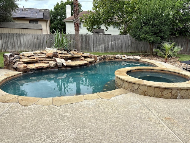 6319 Founding Dr, Katy, TX 77449 - view of swimming pool with a fenced backyard and a pool with connected hot tub