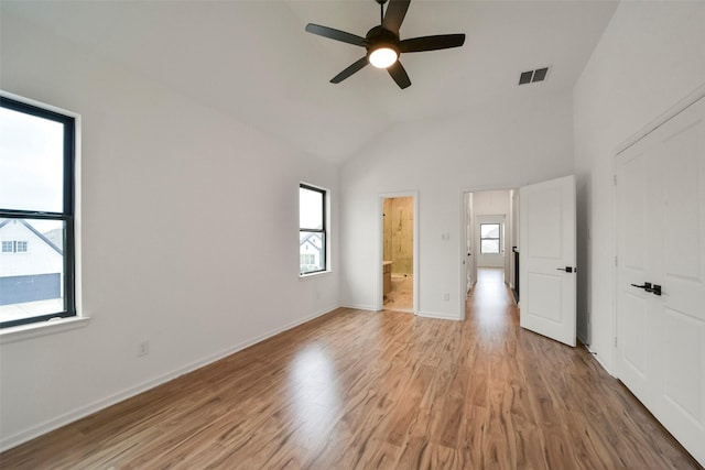 29602 Beech Tree Bnd, Fulshear, TX 77494 - unfurnished bedroom featuring light wood-type flooring, ensuite bath, high vaulted ceiling, and a ceiling fan