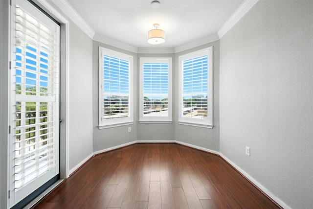 7575 Kirby Dr Unit 2204, Houston, TX 77030 - spare room featuring crown molding and dark wood-style flooring