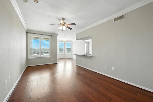 7575 Kirby Dr Unit 2204, Houston, TX 77030 - unfurnished living room featuring a ceiling fan, ornamental molding, dark wood-style floors, and a textured ceiling