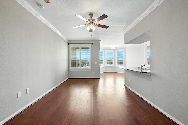 7575 Kirby Dr Unit 2204, Houston, TX 77030 - unfurnished living room with ceiling fan, dark wood-type flooring, ornamental molding, and a textured ceiling