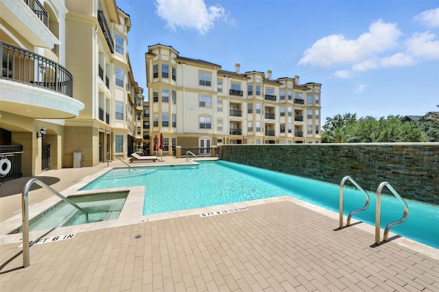 7575 Kirby Dr Unit 2204, Houston, TX 77030 - community pool featuring a patio