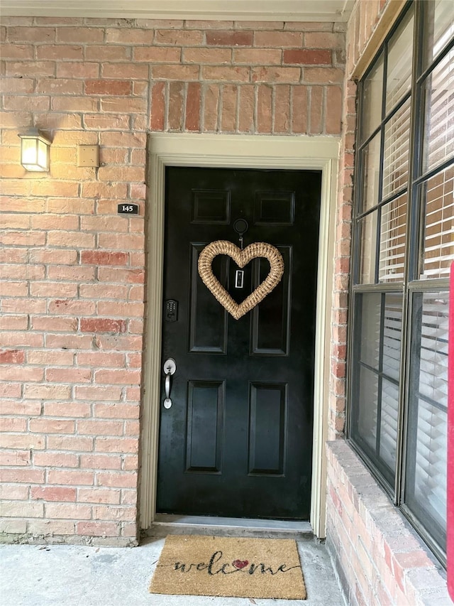 2255 Braeswood Park Dr Unit 145, Houston, TX 77030 - property entrance featuring brick siding