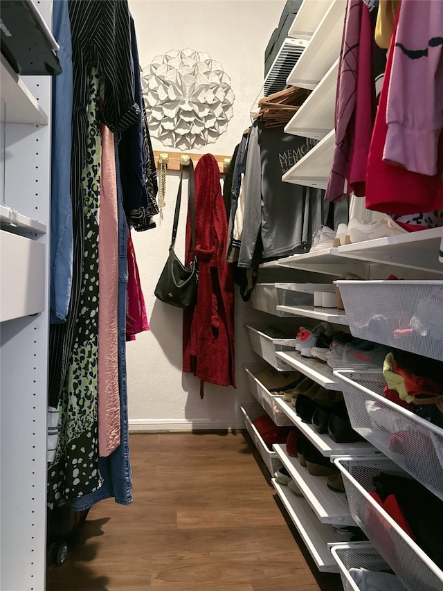 2255 Braeswood Park Dr Unit 145, Houston, TX 77030 - spacious closet featuring wood finished floors