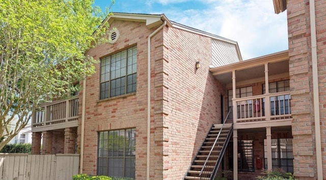 2255 Braeswood Park Dr Unit 145, Houston, TX 77030 - view of building exterior featuring stairway