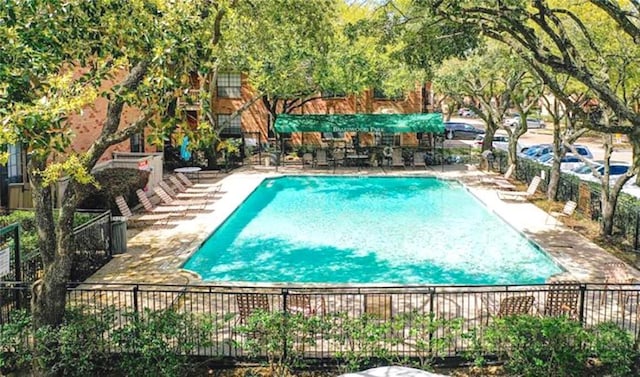 2255 Braeswood Park Dr Unit 145, Houston, TX 77030 - community pool with a patio