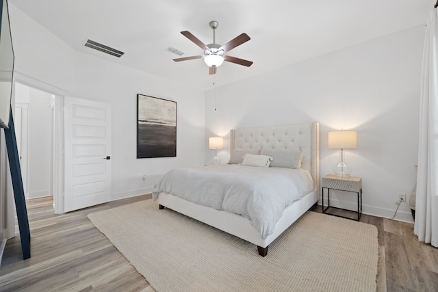 18615 Parkland Xing, Cypress, TX 77433 - bedroom featuring light wood finished floors and a ceiling fan