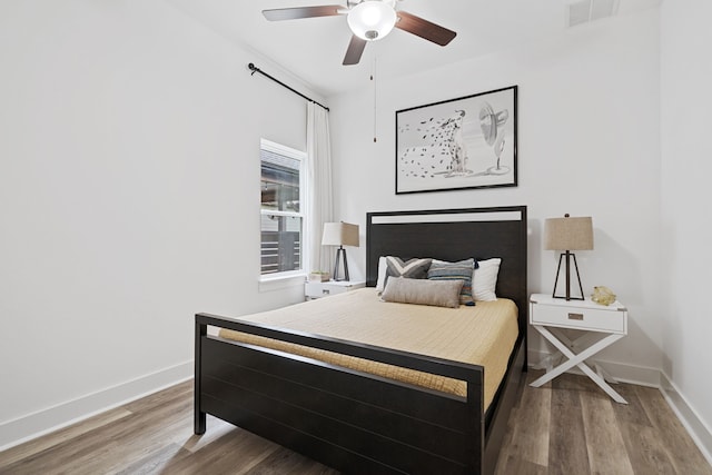 18615 Parkland Xing, Cypress, TX 77433 - bedroom featuring wood finished floors and a ceiling fan