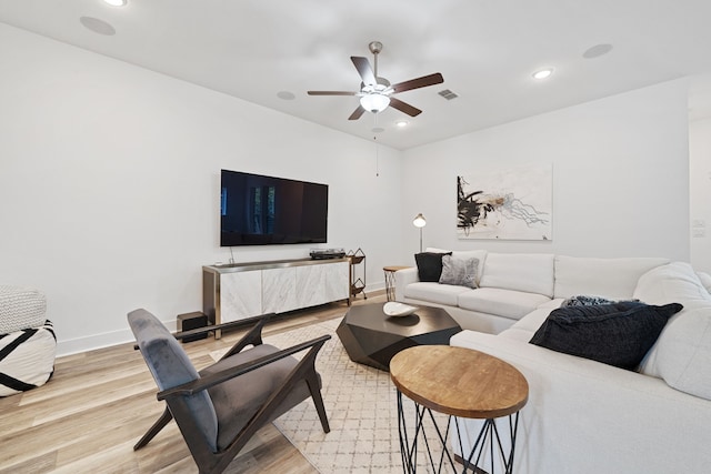 18615 Parkland Xing, Cypress, TX 77433 - living area with light wood-style floors, a ceiling fan, and recessed lighting