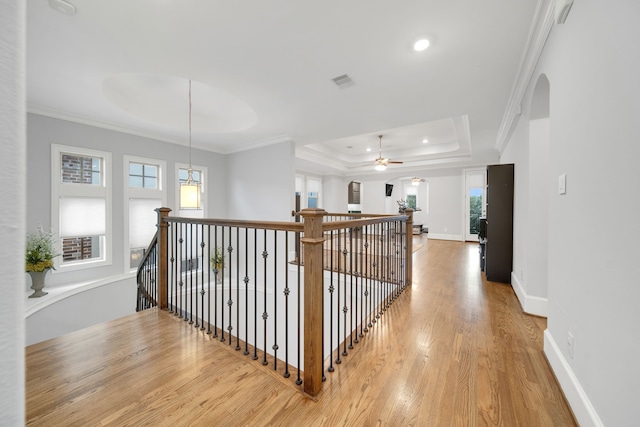 1302 Westview Garden Ct, Houston, TX 77055 - corridor with a raised ceiling, an upstairs landing, wood finished floors, recessed lighting, and crown molding