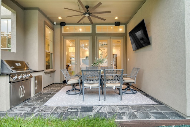1302 Westview Garden Ct, Houston, TX 77055 - view of patio featuring ceiling fan, an outdoor kitchen, and outdoor dining area