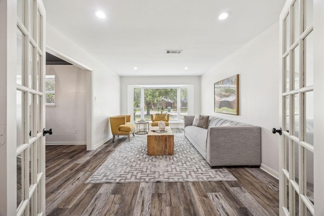 5515 Dumfries Dr, Houston, TX 77096 - living area featuring french doors, dark wood finished floors, and recessed lighting