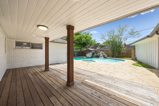 5515 Dumfries Dr, Houston, TX 77096 - wooden terrace with a fenced backyard and a patio area