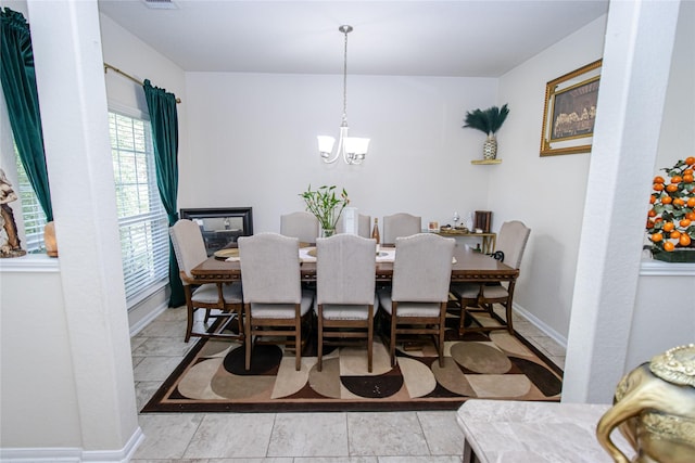 8222 Pastel Dawn Trce, Houston, TX 77049 - dining room with a chandelier and baseboards