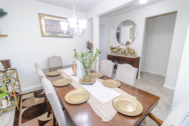 8222 Pastel Dawn Trce, Houston, TX 77049 - dining room with a chandelier and baseboards
