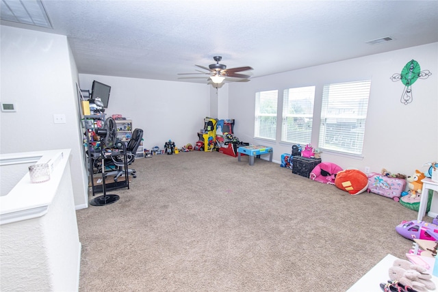 8222 Pastel Dawn Trce, Houston, TX 77049 - playroom with carpet floors and a ceiling fan
