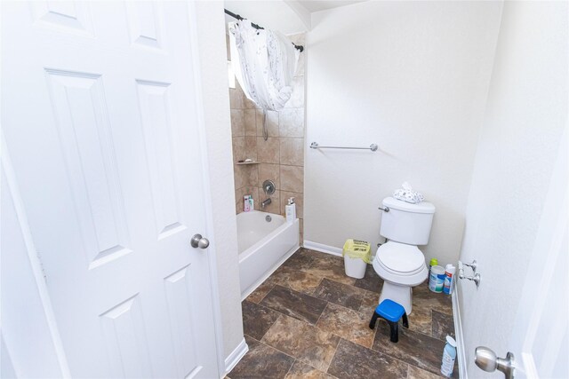 8222 Pastel Dawn Trce, Houston, TX 77049 - bathroom featuring shower / tub combo and stone finish floors