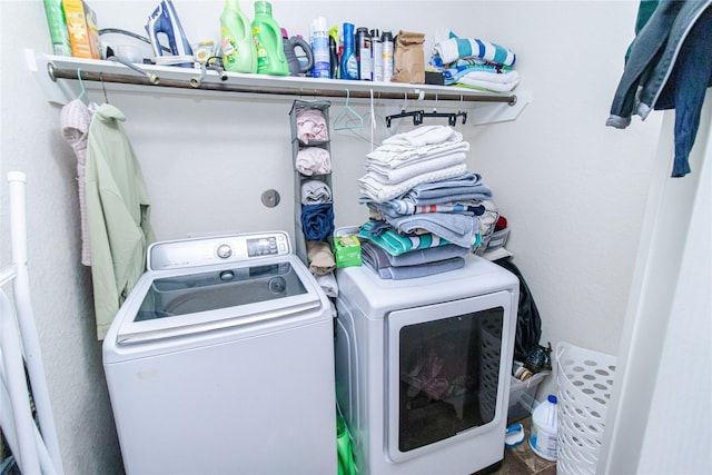 8222 Pastel Dawn Trce, Houston, TX 77049 - laundry room with washer and dryer
