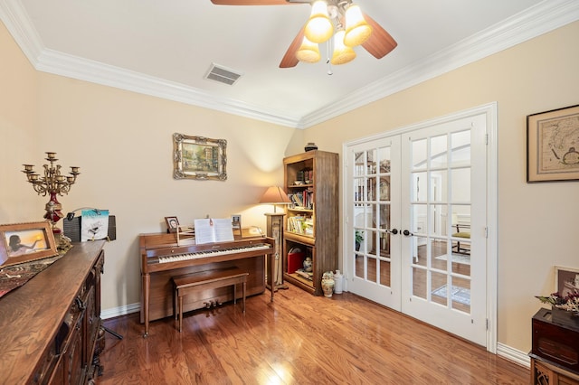 16018 Lower Lake Dr, Cypress, TX 77433 - living area featuring ornamental molding, wood finished floors, french doors, and ceiling fan
