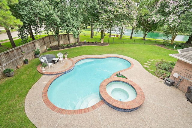 16018 Lower Lake Dr, Cypress, TX 77433 - view of swimming pool with a water view, a fenced backyard, a patio, and a pool with connected hot tub