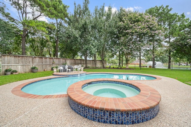 16018 Lower Lake Dr, Cypress, TX 77433 - view of swimming pool with a fenced backyard and an in-ground hot tub