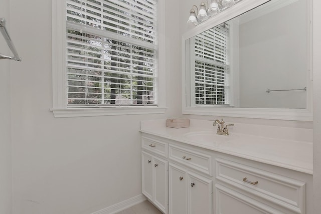 26 W Fairbranch Cir, The Woodlands, TX 77382 - bathroom featuring vanity and baseboards
