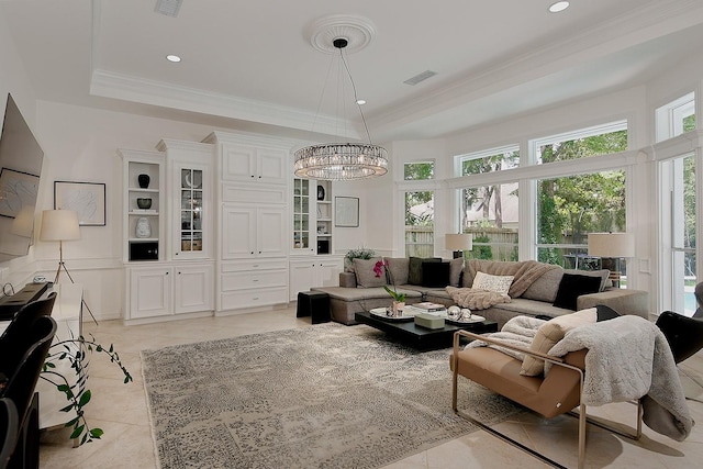 26 W Fairbranch Cir, The Woodlands, TX 77382 - living area with a tray ceiling, a chandelier, light tile patterned floors, ornamental molding, and recessed lighting