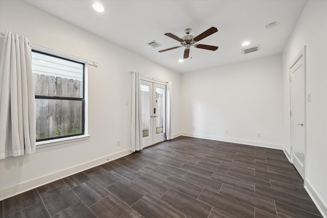 1408 Ruthven St, Houston, TX 77019 - unfurnished room with ceiling fan, recessed lighting, dark wood-type flooring, and a smoke detector