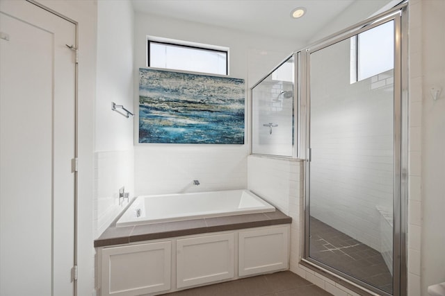1408 Ruthven St, Houston, TX 77019 - bathroom featuring a bath, a stall shower, tile patterned floors, and recessed lighting