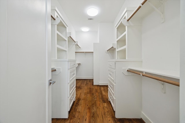 1408 Ruthven St, Houston, TX 77019 - walk in closet featuring dark wood-type flooring