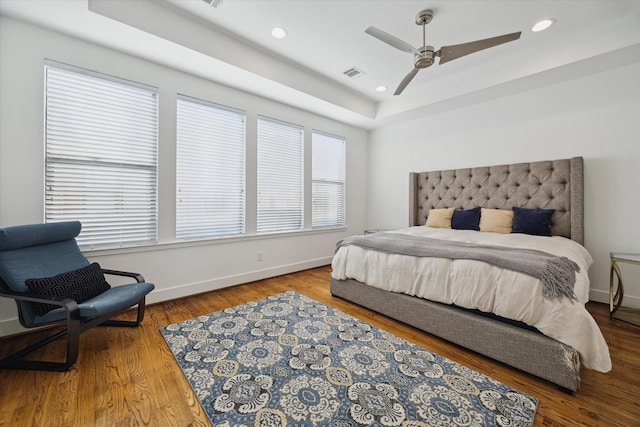 1408 Ruthven St, Houston, TX 77019 - bedroom with a raised ceiling, wood finished floors, a ceiling fan, and recessed lighting