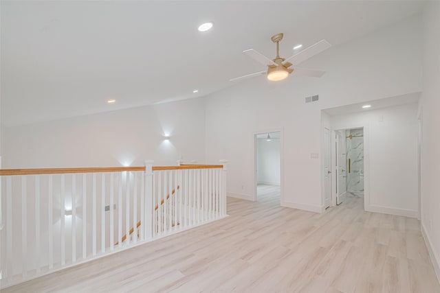 17802 Poppy Trails Ln, Houston, TX 77084 - spare room featuring ceiling fan, wood finished floors, recessed lighting, and high vaulted ceiling