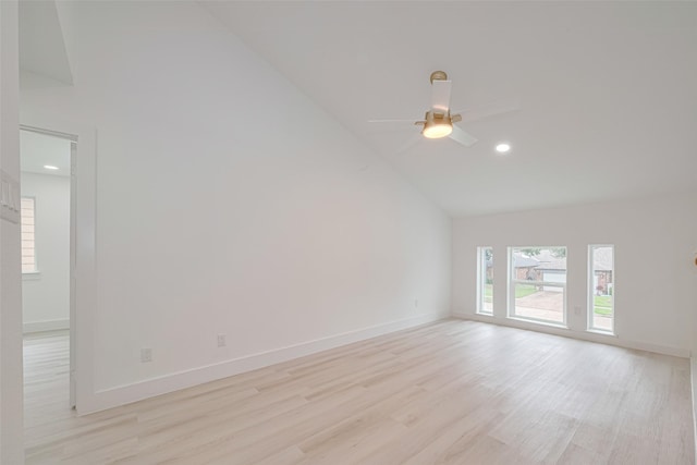 17802 Poppy Trails Ln, Houston, TX 77084 - empty room with light wood finished floors, high vaulted ceiling, a ceiling fan, and recessed lighting
