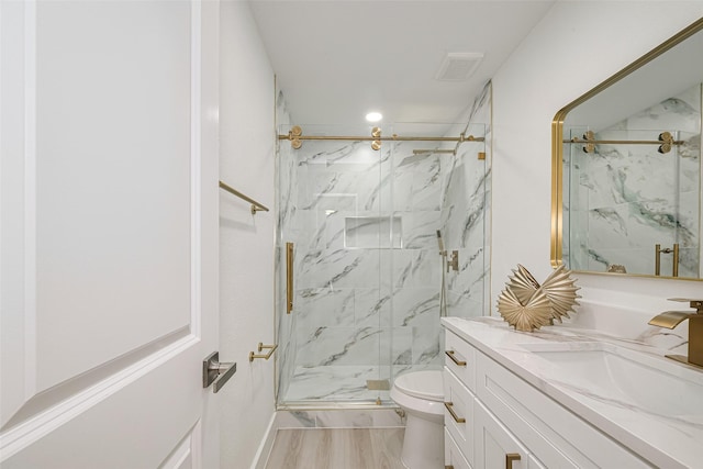 17802 Poppy Trails Ln, Houston, TX 77084 - bathroom featuring vanity and a marble finish shower