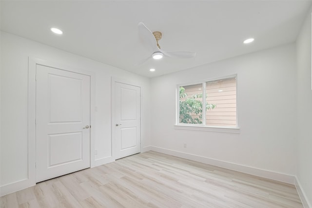 17802 Poppy Trails Ln, Houston, TX 77084 - unfurnished bedroom featuring light wood-style floors, recessed lighting, and ceiling fan