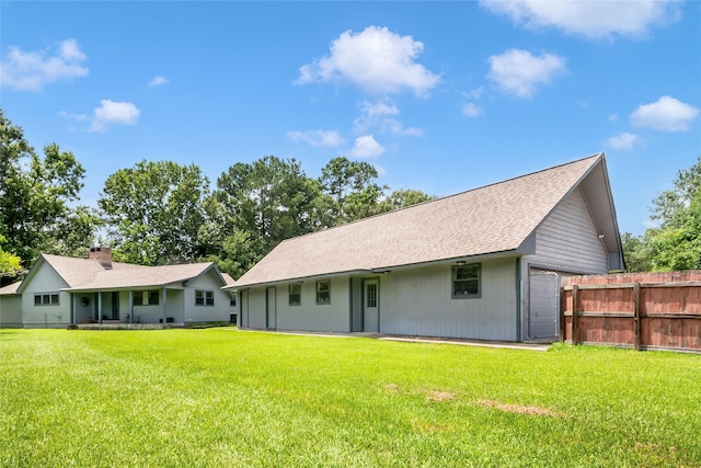 24917 W Christine Dr, Splendora, TX 77372 - back of house featuring a shingled roof