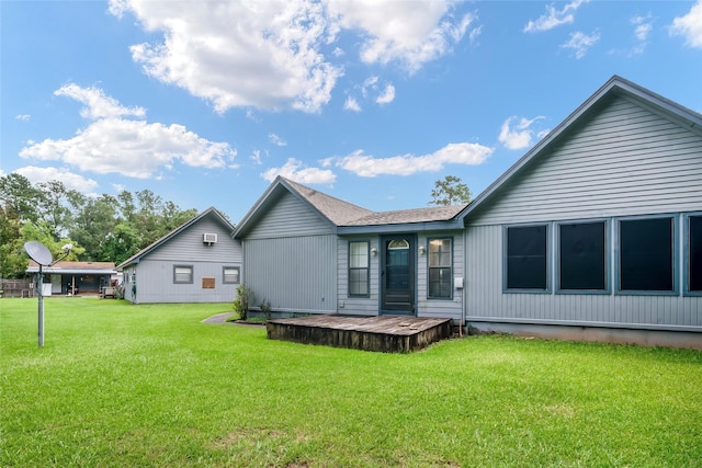 24917 W Christine Dr, Splendora, TX 77372 - rear view of property with a lawn and a wooden deck