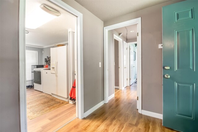 24917 W Christine Dr, Splendora, TX 77372 - hall with light wood-type flooring and baseboards