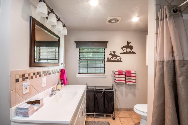24917 W Christine Dr, Splendora, TX 77372 - bathroom featuring tile patterned floors, vanity, a shower with shower curtain, and backsplash