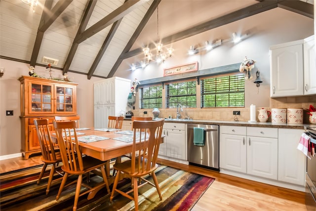 24917 W Christine Dr, Splendora, TX 77372 - dining area with light wood-style flooring, a chandelier, a wooden ceiling with exposed beams, and high vaulted ceiling