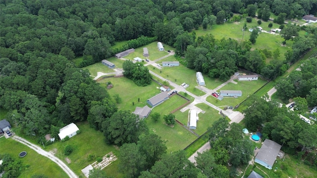 24917 W Christine Dr, Splendora, TX 77372 - view of property location with a heavily wooded area