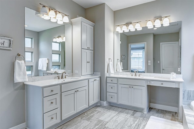 28606 Royal Pines Ct, Fulshear, TX 77441 - full bath featuring two vanities, healthy amount of natural light, and a bathtub